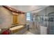 Relaxing bathroom with a soaking tub, walk-in shower, and pebble floor at 4201 Palacio Dr, Sarasota, FL 34238