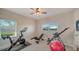 Home gym with stationary bikes and weight equipment at 4201 Palacio Dr, Sarasota, FL 34238