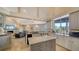 Gourmet kitchen with granite island and high-end appliances at 4201 Palacio Dr, Sarasota, FL 34238