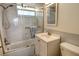 Updated bathroom with a tub shower, vanity, and toilet at 4310 Falmouth Dr # A104, Longboat Key, FL 34228