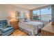 Bedroom with water views and ample dresser space at 4310 Falmouth Dr # A104, Longboat Key, FL 34228