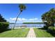 Enjoy the view from this waterfront dock with a bench at 4310 Falmouth Dr # A104, Longboat Key, FL 34228