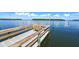 Serene waterfront dock perfect for fishing or relaxing at 4310 Falmouth Dr # A104, Longboat Key, FL 34228