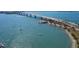 Aerial view of a bridge spanning a body of water with boats and shoreline visible at 4539 Longspur Ln, Sarasota, FL 34238