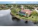 Aerial view of waterfront home with pool at 4539 Longspur Ln, Sarasota, FL 34238