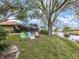 Serene backyard oasis with lake view and seating at 4539 Longspur Ln, Sarasota, FL 34238