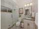 Clean bathroom with shower, toilet, and updated vanity at 4539 Longspur Ln, Sarasota, FL 34238