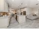 Modern kitchen with white cabinets, granite countertops, and stainless steel appliances at 4539 Longspur Ln, Sarasota, FL 34238