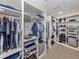 Spacious walk-in closet with ample shelving and hanging space at 4539 Longspur Ln, Sarasota, FL 34238