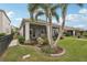 Screened patio and landscaped backyard with lush greenery at 4629 Garden Arbor Way, Bradenton, FL 34203