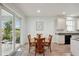 Kitchen with dining area and sliding glass doors to patio at 4629 Garden Arbor Way, Bradenton, FL 34203