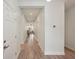 Bright hallway with tile flooring leading to living spaces at 4629 Garden Arbor Way, Bradenton, FL 34203