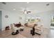 Relaxing living room featuring comfortable seating and large windows at 4629 Garden Arbor Way, Bradenton, FL 34203