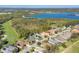 Aerial view of a luxury community near a lake and golf course at 4838 88Th E St, Bradenton, FL 34211