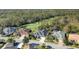 Aerial view of houses in a community near a golf course at 4838 88Th E St, Bradenton, FL 34211