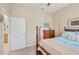 Bedroom with a double bed and access to the bathroom at 4838 88Th E St, Bradenton, FL 34211