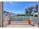 Balcony view overlooking tennis courts and resort-style amenities at 5055 Gulf Of Mexico Dr # 424, Longboat Key, FL 34228