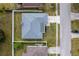 Aerial view showcasing the house and surrounding neighborhood at 5117 19Th E Ln, Bradenton, FL 34203