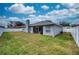 Spacious backyard with grassy area and fenced perimeter at 5117 19Th E Ln, Bradenton, FL 34203