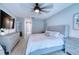 Spacious bedroom with large bed, dresser, and calming color palette at 5117 19Th E Ln, Bradenton, FL 34203