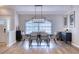 Modern dining room with hardwood floors and large windows at 5117 19Th E Ln, Bradenton, FL 34203