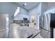 Modern kitchen featuring stainless steel appliances and a breakfast bar at 5117 19Th E Ln, Bradenton, FL 34203