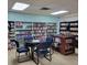 Community library with books, tables, and chairs at 5327 Glen Echo Ave, Sarasota, FL 34234