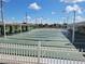 Outdoor shuffleboard courts with white picket fence at 5327 Glen Echo Ave, Sarasota, FL 34234