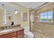 Bathroom with shower, toilet, vanity, and granite countertop at 550 Yardarm Ln, Longboat Key, FL 34228