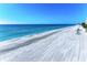 Scenic beach view with calm water and white sand at 550 Yardarm Ln, Longboat Key, FL 34228