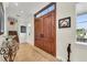 Bright and spacious entryway with double doors at 550 Yardarm Ln, Longboat Key, FL 34228