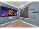 Dedicated home theater with large screen and seating at 550 Yardarm Ln, Longboat Key, FL 34228