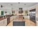 Gourmet kitchen featuring granite countertops and stainless steel appliances at 550 Yardarm Ln, Longboat Key, FL 34228