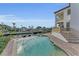 Inviting pool and spa with a waterfront view at 550 Yardarm Ln, Longboat Key, FL 34228