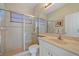 Clean bathroom with shower and sink at 5655 Eastwind Dr, Sarasota, FL 34233