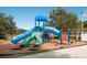 Community playground with slides and swings at 5655 Eastwind Dr, Sarasota, FL 34233