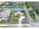 Aerial view of a single-Gathering home near the water at 5830 Gulf Of Mexico Dr, Longboat Key, FL 34228