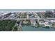 Aerial view of house near the beach and waterway at 5830 Gulf Of Mexico Dr, Longboat Key, FL 34228