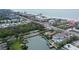 Aerial view of waterfront home with private dock and pool, near beach at 5830 Gulf Of Mexico Dr, Longboat Key, FL 34228