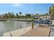 Private boat dock with lift and water access at 5830 Gulf Of Mexico Dr, Longboat Key, FL 34228