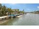 Nice canal front view with boat lift at 5830 Gulf Of Mexico Dr, Longboat Key, FL 34228