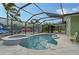 Enclosed pool and spa with tropical-themed walls at 5830 Gulf Of Mexico Dr, Longboat Key, FL 34228