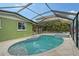 Enclosed pool and spa with tropical-themed walls at 5830 Gulf Of Mexico Dr, Longboat Key, FL 34228