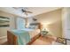 Guest bedroom with a comfortable bed and neutral decor at 5890 Guarino Dr, Sarasota, FL 34238