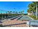 Two bocce ball courts with seating area at 5890 Guarino Dr, Sarasota, FL 34238