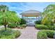 Lakeside gazebo with seating, offering scenic views at 5890 Guarino Dr, Sarasota, FL 34238