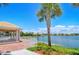 Community gazebo near lake with scenic views at 5890 Guarino Dr, Sarasota, FL 34238