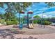 Community playground with slides and climbing structures at 5890 Guarino Dr, Sarasota, FL 34238