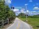 Entrance to The Legacy Trail, a paved path perfect for walking or cycling at 5890 Guarino Dr, Sarasota, FL 34238