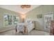 Bright bedroom with a comfortable bed and plenty of natural light at 5911 Doral Dr, Sarasota, FL 34243